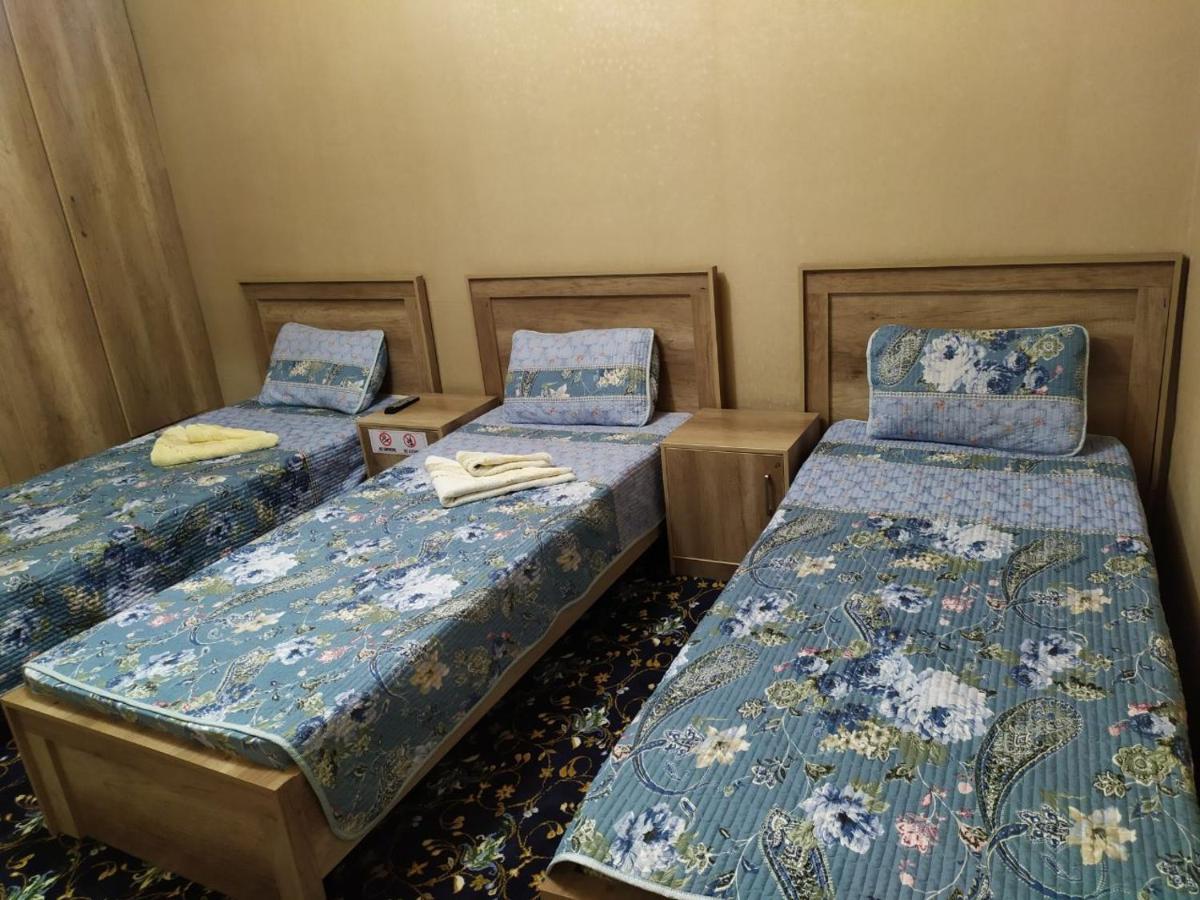 Uvaysiy Family Guest House Marghilon ภายนอก รูปภาพ